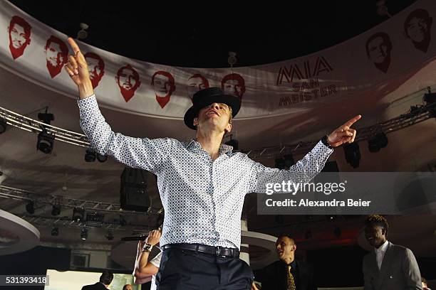 Thomas Muller dances as Music band, OneRepublic performs at the FC Bayern Muenchen Bundesliga Champions Dinner at the Postpalast on May 14, 2016 in...