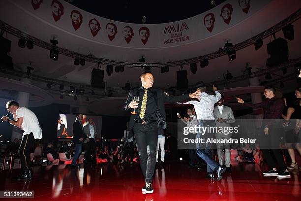 Thomas Muller, Robert Lewandowski, Philipp Lahm and Rafinha dance as music band, OneRepublic performs at the FC Bayern Muenchen Bundesliga Champions...