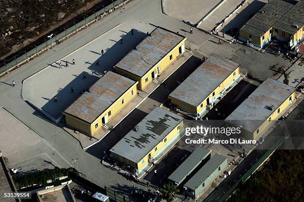 An aerial view of the Lampedusa temporary holding center for foreign nationals is seen by an Italian Custom Police "Guardia di Finanza" helicopter on...