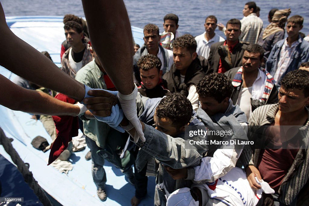 Italian Border Patrols Pick Up Boatloads Of Illegal Immigrants