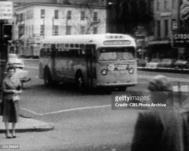 Screen capture shows a bus on the road during the bus boycott in Montgomery, Alabama, late 1955.