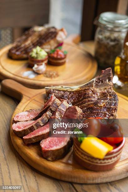 rib eye steak - tomahawk stock pictures, royalty-free photos & images