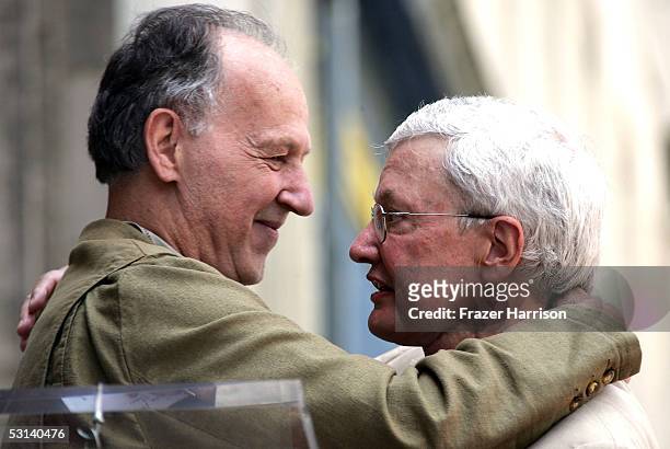 Director Werner Herzog and Movie Critic Roger Ebert hug as Ebert receives the 2,288th Star on the Hollywood Walk of Fame June 23, 2005 in Hollywood,...