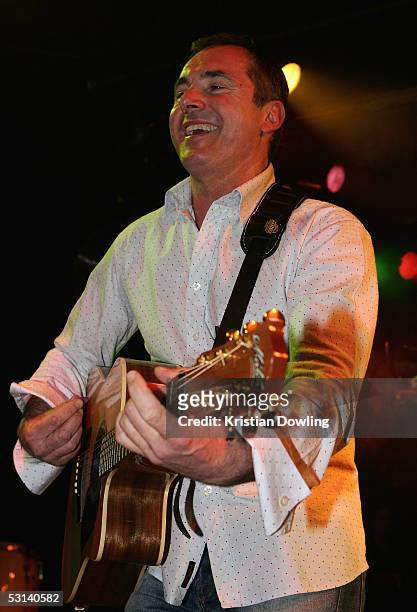 Actor Alan Fletcher performs at the Neighbours Rocks for AIDS Fundraiser June 23, 2005 at the Palace in Melbourne, Australia.