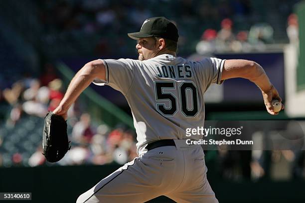 Pitcher Todd Jones of the Florida Marlins delivers a pitch against the Los Angeles Angels of Anaheim during the MLB game at Angel Stadium on June 19,...