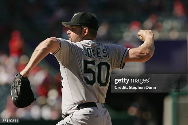 Pitcher Todd Jones of the Florida Marlins delivers a pitch against the Los Angeles Angels of Anaheim during the MLB game at Angel Stadium on June 19,...