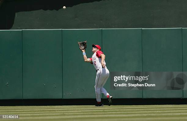 Steve Finley of the Los Angeles Angels of Anaheim waits for the ball against the Florida Marlins during the MLB game at Angel Stadium on June 19,...