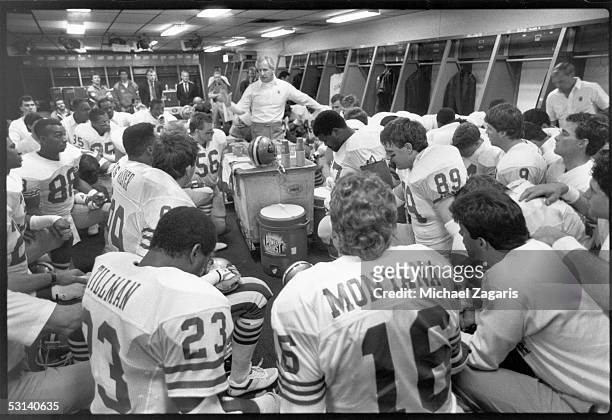Head coach George Seifert of the San Francisco 49ers addresses his team before Super Bowl XXIV against the Denver Broncos at the Louisiana Superdome...