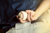 Baseball pitcher ready to pitch. Close up of hand