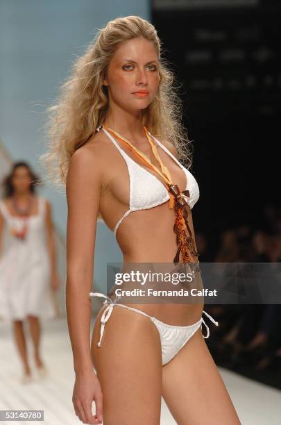 Model Ana Claudia Michels walks down the runway during the Totem Summer 2006 fashion show at Rio's Modern Art Museum during Rio Fashion Week on June...