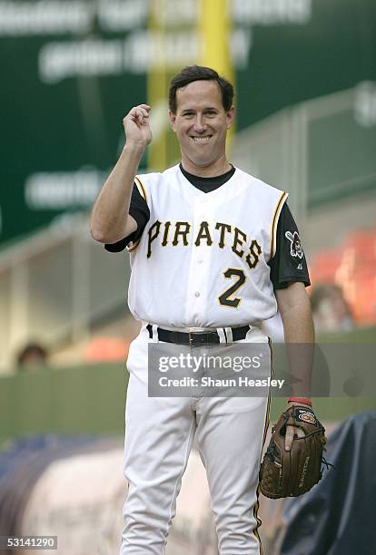 Senator Rick Santorum gestures as he warms up at the 44th Annual Congressional Baseball Game on June 23, 2005 at RFK Stadium in Washington, DC. The...