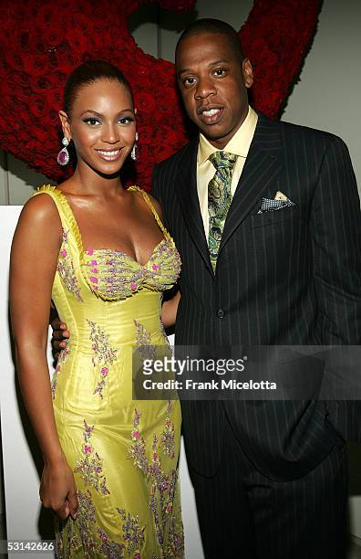 Singer Beyonce Knowles poses with Jay-Z at the "Beyonce: Beyond the Red Carpet auction presented by Beyonce and her mother Tina Knowles along with...