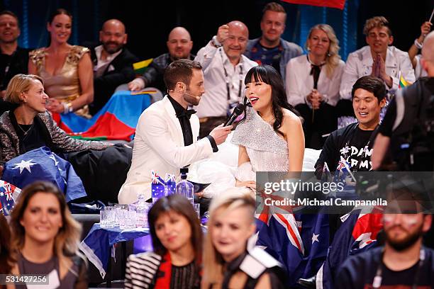 Host Mans Zelmerlow and Dami Im representing Australia is seen at the Ericsson Globe on May 14, 2016 in Stockholm, Sweden.