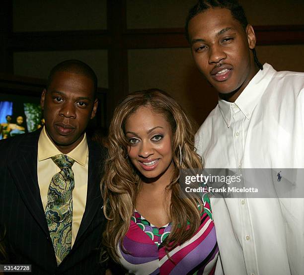 Jay-Z, MTV VJ La La and basketball player Carmelo Anthony attend the "Beyonce: Beyond the Red Carpet auction presented by Beyonce and her mother Tina...