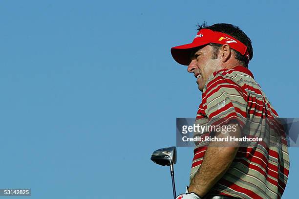 Paul McGinley of Ireland tee's off at the 13th during the completion of the weather delayed first round of the Open de France at Le Golf National on...