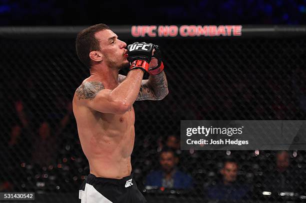 Renato Moicano of Brazil celebrates after defeating Zubaira Tukhugov of Russia in their featherweight bout during the UFC 198 event at Arena da...