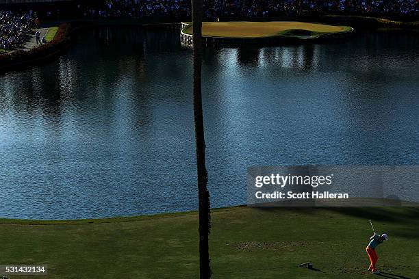 Russell Knox of Scotland plays a shot from the 17th tee during the third round of THE PLAYERS Championship at the Stadium course at TPC Sawgrass on...