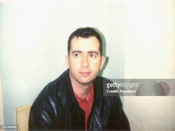 In this handout photo provided by the Metropolitan Police, former bar-tender Robert Hendy-Freegard poses for the camera following his conviction for...
