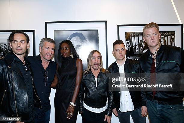 Musician Dean Fertita, photographer Andreas Neumann, his wife model Khadija Neumann, singer Iggy Pop, photographer Matt Helders and musician Josh...