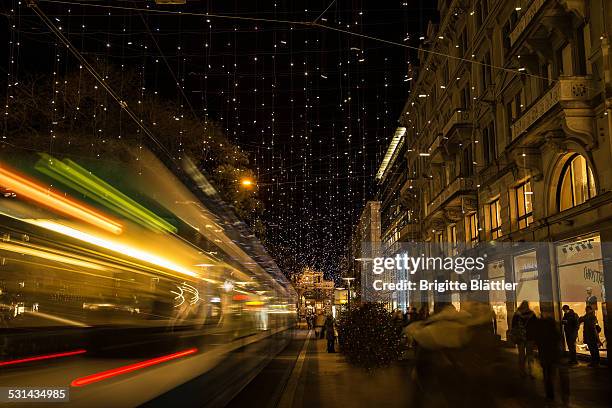 zurich mainstation, bahnhofstrasse - tram zürich stock pictures, royalty-free photos & images