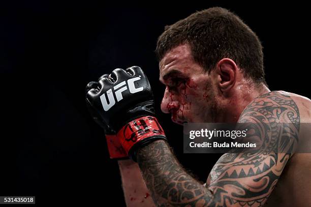 Renato Mocaio of Brazil looks on prior to Zubaira Tukhugov of Russia in their featherweight bout during the UFC 198 at Arena da Baixada stadium on...