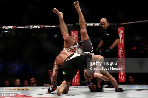 Renato Mocaio of Brazil competes Zubaira Tukhugov of Russia in their featherweight bout during the UFC 198 at Arena da Baixada stadium on May 14,...