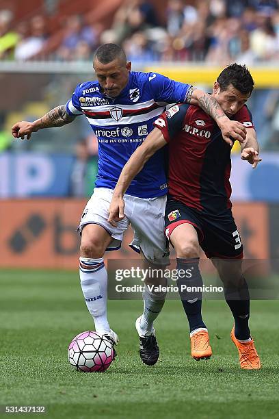 Blerim Dzemaili of Genoa CFC is challenged by Angelo Palombo of UC Sampdoria during the Serie A match between UC Sampdoria and Genoa CFC at Stadio...