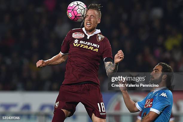 Pontus Jansson of Torino FC in action against Gonzalo Higuain of SSC Napoli during the Serie A match between Torino FC and SSC Napoli at Stadio...