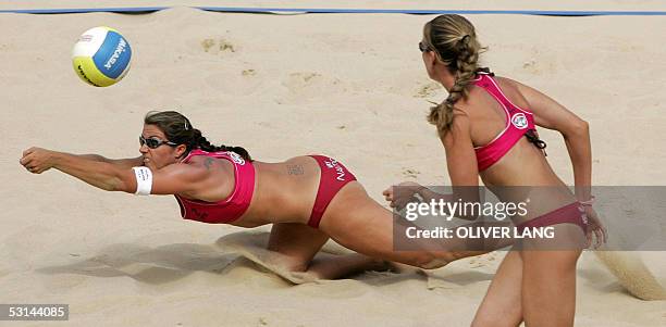 Kerri Walsh and Misty May-Treanor of the US vie for the ball during their match of the Beach Volleyball World Championships against Jia Tian and Fei...