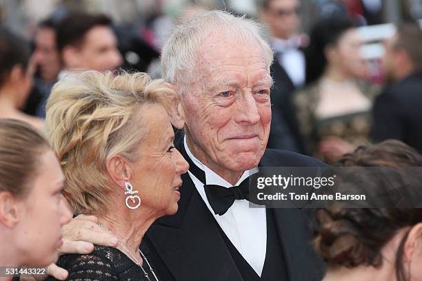 Catherine Brelet and Max Von Sydow attend a screening of "The BFG" at the annual 69th Cannes Film Festival at Palais des Festivals on May 14, 2016 in...