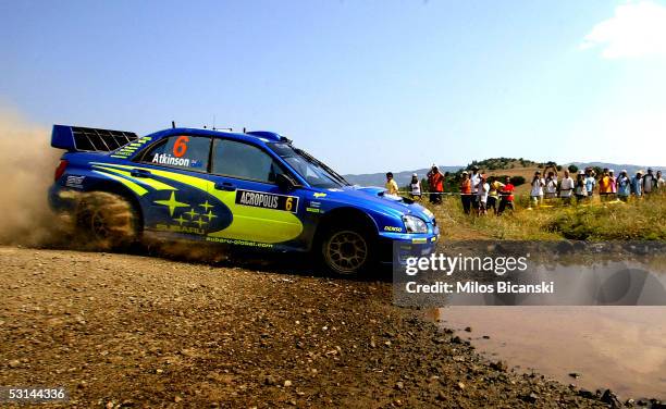 Chris Atkinson of Australia drives his Subaru Impreza during day 1 of the Acropolis Rally of Greece on June 24, 2005 in Regini, Greece.