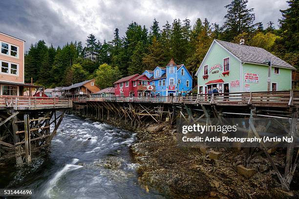 view of historic wooden architectures above ketchikan creek, creek street, ketchikan, alaska - alaska stock pictures, royalty-free photos & images