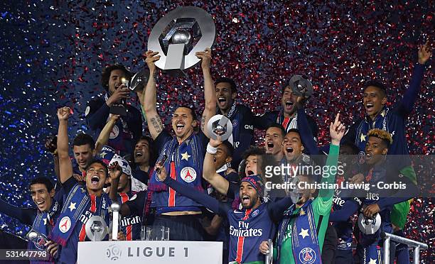 Zlatan Ibrahimovic of PSG celebrates with teammates winning Ligue 1 championship during the ceremony folling the French LIGUE match betweenParis...