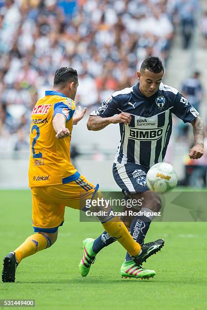 Edwin Cardona of Monterrey fights for the ball with Israel Jimenez of Tigres during the quarter finals second leg match between Monterrey and Tigres...