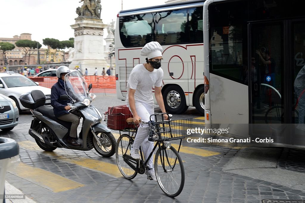 Cycling Dressed As A Chef In Rome