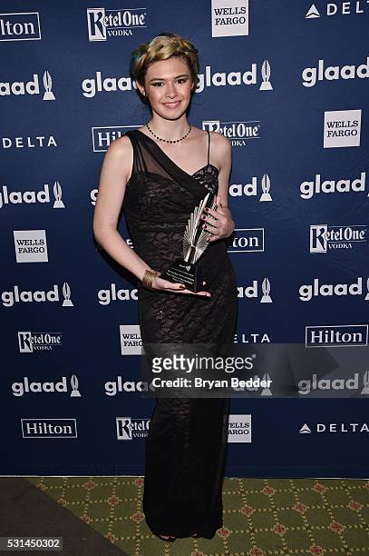 Actress Nicole Maines poses backstage with an award at the 27th Annual GLAAD Media Awards in New York on May 14, 2016 in New York City.