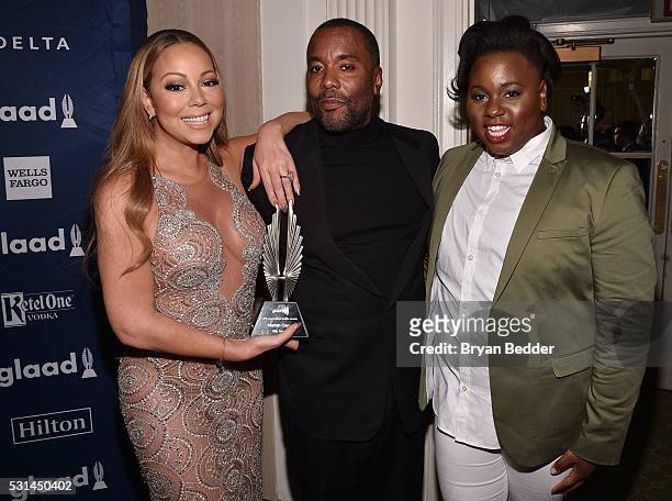 Mariah Carey, Lee Daniels, Alex Newell pose backstage with an award at the 27th Annual GLAAD Media Awards in New York on May 14, 2016 in New York...