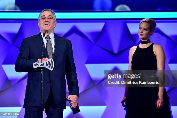 Robert De Niro and Jennifer Lawrence speak onstage during the 27th Annual GLAAD Media Awards at Waldorf Astoria Hotel in New York on May 14, 2016 in...
