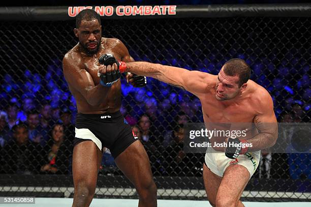 Mauricio 'Shogun' Rua of Brazil punches Corey Anderson in their light heavyweight bout during the UFC 198 event at Arena da Baixada stadium on May...