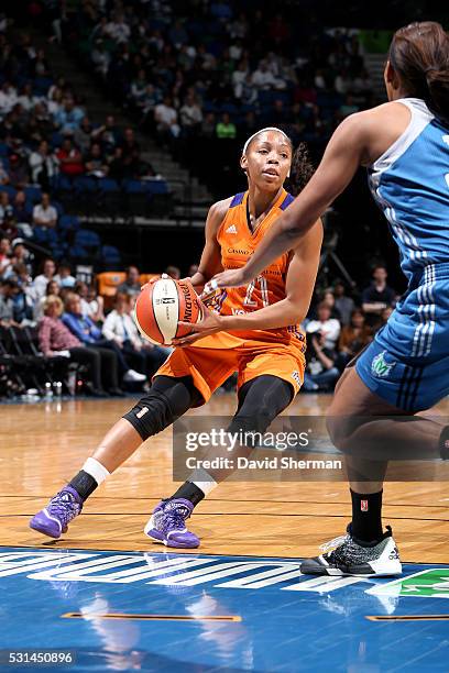 Nirra Fields of the Phoenix Mercury handles the ball during the game against the Minnesota Lynx during the WNBA game on May 14, 2016 at Target Center...