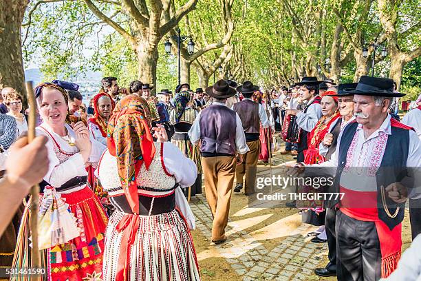 folk dancers leaving the stage after their performance - ponte de lima stock pictures, royalty-free photos & images