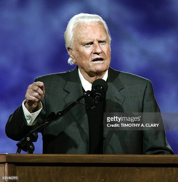 Evangelist Billy Graham delivers his message at the Billy Graham Crusade at Flushing Meadows Park 24 June 2005 in Flushing Meadows, New York. This...