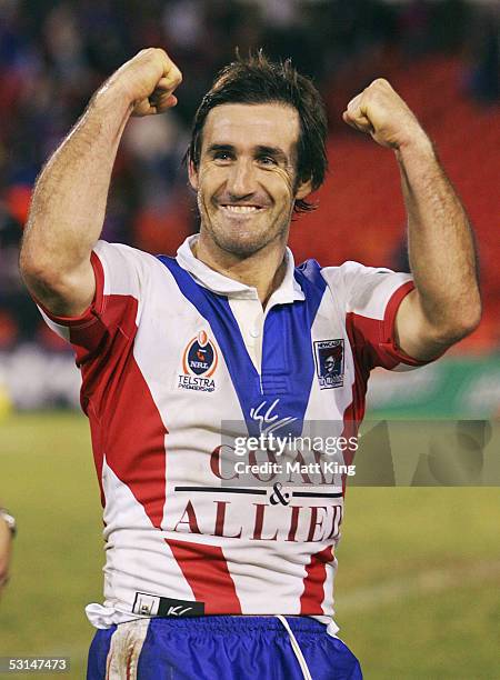 Andrew Johns of the Knights celebrates their first win of the season during the round 16 NRL match between the Penrith Panthers and the Newcastle...