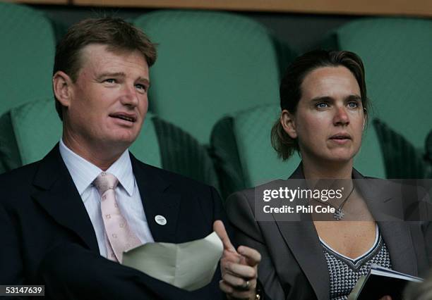 Ernie Els the South African golfer and his wife Liesl watch the tennis on Centre Court during the sixth day of the Wimbledon Lawn Tennis Championship...