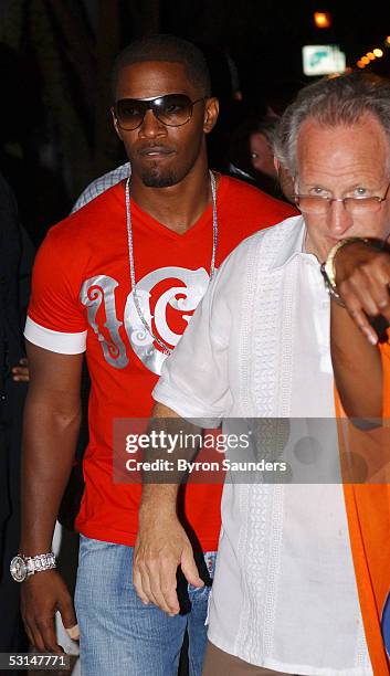 Jamie Foxx and director Michael Mann are seen outside the Delano Hotel where they were having a party to kick off filming of "Miami Vice" on June 24,...