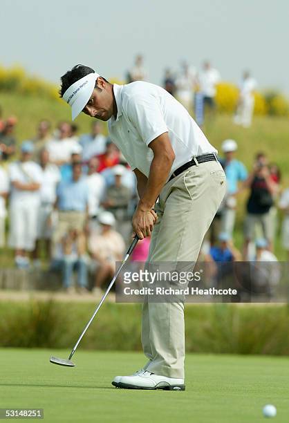 Jean Van De Velde of France putts on the 18th green during the third round of the Open de France at Le Golf National on June 25, 2005 in St Quentin...