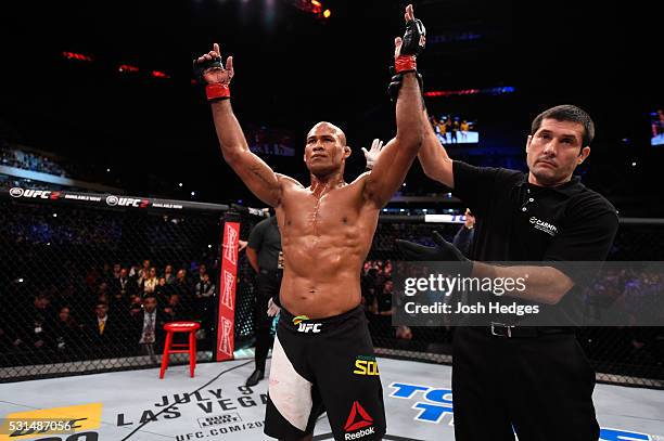 Ronaldo 'Jacare' Souza of Brazil celebrates after defeating Vitor Belfort of Brazil in their middleweight bout during the UFC 198 event at Arena da...