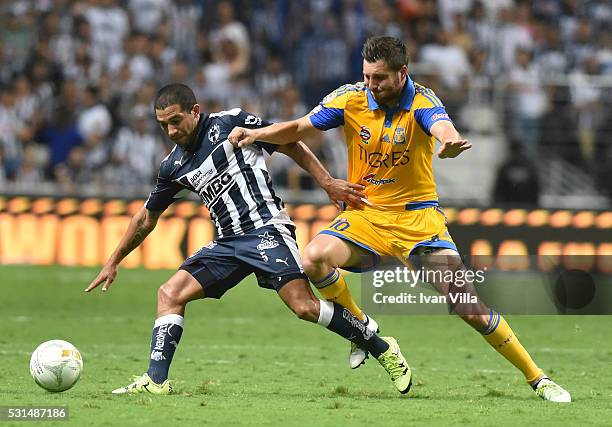 Walter Gargano of Monterrey fights for the ball with Andre Gignac of Tigres during the quarter finals second leg match between Monterrey and Tigres...