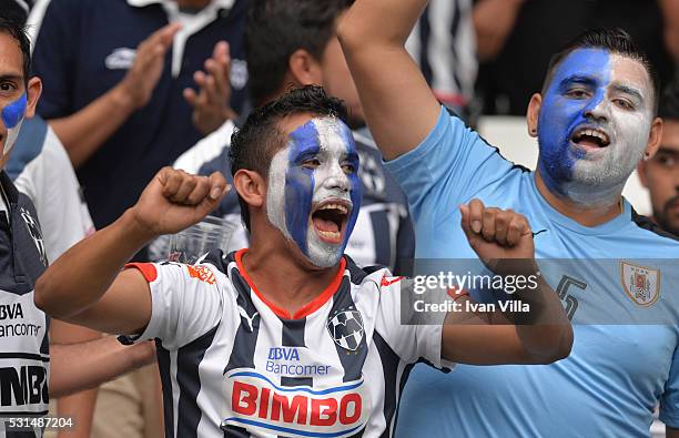 Fans of Monterrey cheer their team during the quarter finals second leg match between Monterrey and Tigres UANL as part of the Clausura 2016 Liga MX...