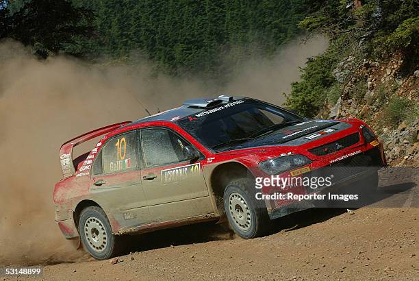 Gigi Galli and Guido D'Amore drive their Mitsubishi Lancer during day two of the Acropolis Rally of Greece June 25, 2005 in Lamia, Greece.